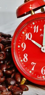 Red alarm clock with coffee beans, vibrant mobile wallpaper.