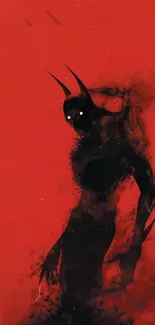 Eerie red demon silhouette artwork on red background.