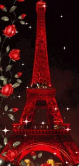 Red Eiffel Tower with glowing red lights and roses at night.