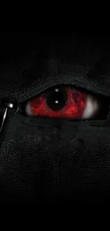 Mysterious red eye in dark shadows, mobile wallpaper.