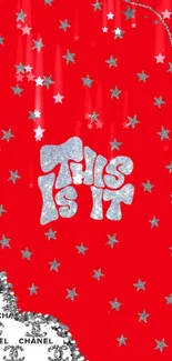 Red wallpaper with glitter stars and text 'This Is It'.