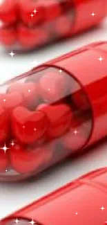 Vibrant red capsules containing heart shapes.