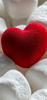 Red heart nestled among white marshmallows creating a charming design.