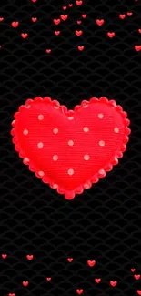 Red heart on black background mobile wallpaper with polka dots.