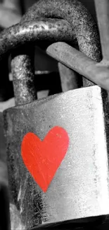 Red heart on a metallic padlock, symbolizing love and security.