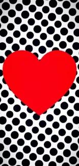 Red heart wallpaper with polka dot design.