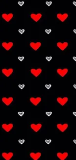 Mobile wallpaper with red and white hearts on a black background.