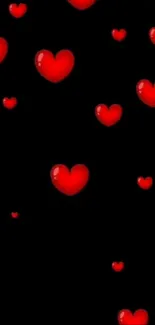 Red hearts on a black background, perfect for romantic themes.