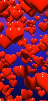 Mobile wallpaper with red hearts on a blue background.