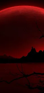 A dark and red moonlit landscape with silhouetted branches and mountains.