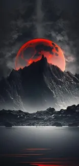 Red moon rising over mountain with dark sky.