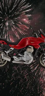 Vibrant red motorcycle with fireworks background.