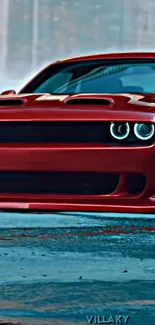 Red muscle car with glowing headlights on road.