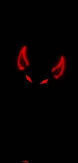 Neon devil eyes with horns in red glow against a dark background.