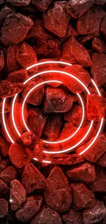 Red neon rings illuminate rocks on a dark mobile wallpaper.