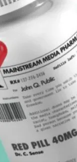 Image of a pill bottle labeled 'Mainstream Media Pharmacy' with red pills.