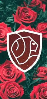 Vibrant red roses with lion emblem on wallpaper.