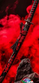 Samurai sword with red smoke background mobile wallpaper.