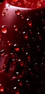 Close-up of red lipstick with water droplets on a dark background.