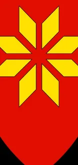 Red shield with yellow star design on wallpaper.