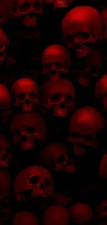 Red skulls on a dark background wallpaper.