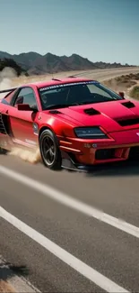 Red sports car racing on a desert road with dust clouds.