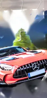 Red sports car driving through scenic landscape wallpaper.