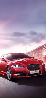 Red sports car speeding on an urban road under a cloudy sky.