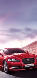 Red sports car driving with motion blur effect.