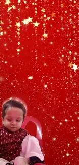 Child sitting under vibrant red starry sky wallpaper.