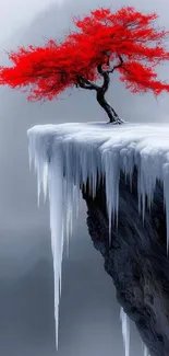 Red tree perched on an icy cliff edge.