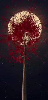 Red tree against a full moon in a starry night sky.