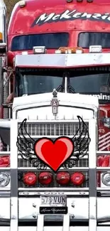 Red truck with chrome details and heart motif on front grille.