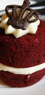 Red velvet dessert with a chocolate crown.