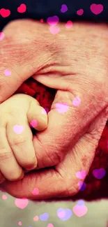 Child and adult hands together in a red coat, symbolizing warmth and connection.