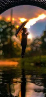 Silhouette with umbrella at sunrise, reflecting over a serene water scene.