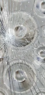 Artistic silver shattered glass pattern wallpaper for mobile phones.