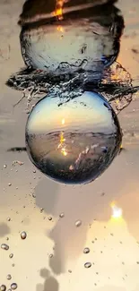 Artistic mobile wallpaper with water bubble reflecting sunset glow.