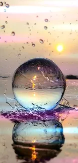 Reflective water sphere with sunset and vibrant colors on mobile wallpaper.