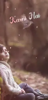 Boy sitting in brown forest setting, exuding serenity and reflection.