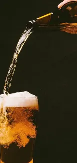 Beer being poured into a glass from a bottle with frothy foam on top.