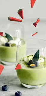 Matcha dessert with blueberries in glass cups.
