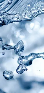 Dynamic water splash close-up with a calm blue backdrop.