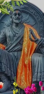 Majestic statue with orange cloak and floral accents.