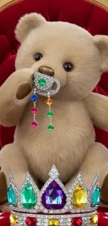 Teddy bear on a throne with crown jewels.