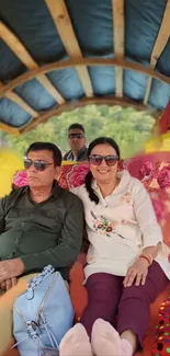 Couple enjoying a relaxing boat ride with colorful surroundings.