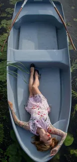 Woman relaxing on a boat surrounded by greenery.