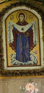 Religious mosaic art depicting a sacred figure with ornate design.