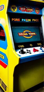 Vibrant retro arcade game machine in yellow.