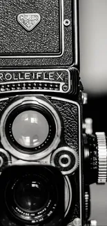 Black and white vintage Rolleiflex camera wallpaper.